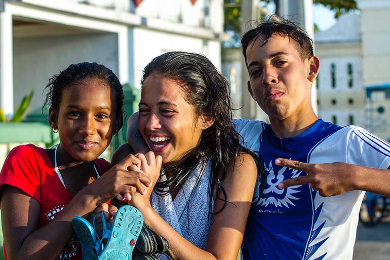 Cuban high school students laughing.